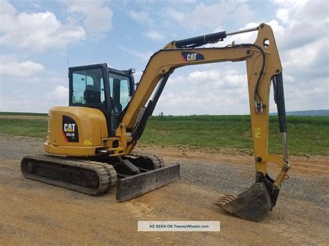 mini excavators with angle blade|cat 305 mini excavators.